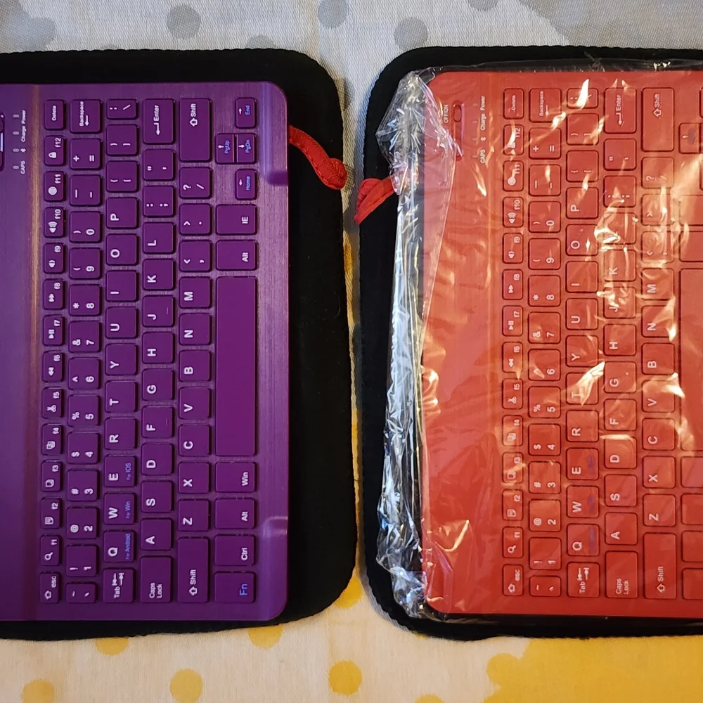 Pair of Bluetooth Keyboards with Cases